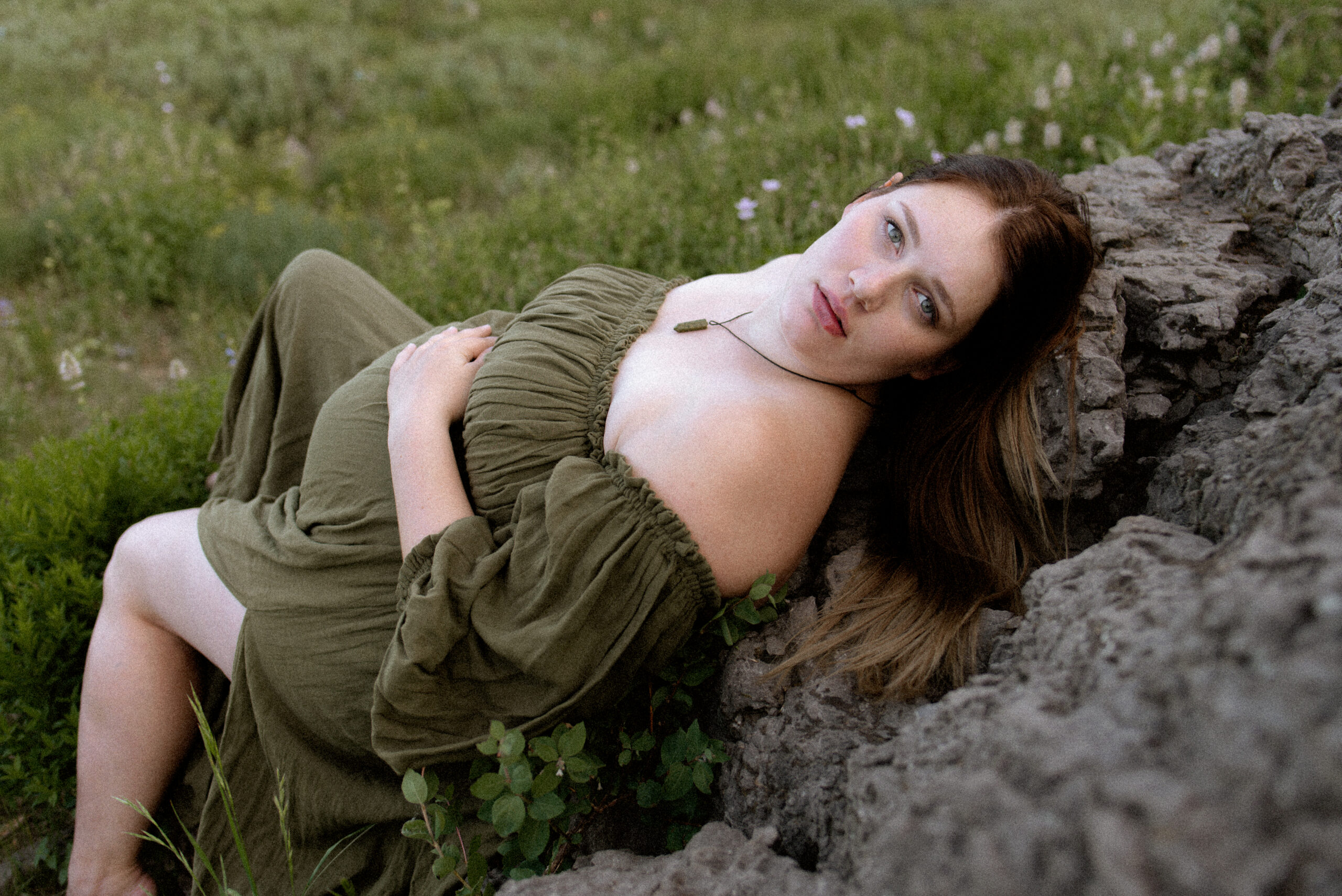 Olive Green two piece Reclamation gown/ Pregnant mama laying on rock looking up / Utah maternity photographer // Photo by Katie Blakeley Creative of Logan Utah. See more at www.katieblakeley.com/blog